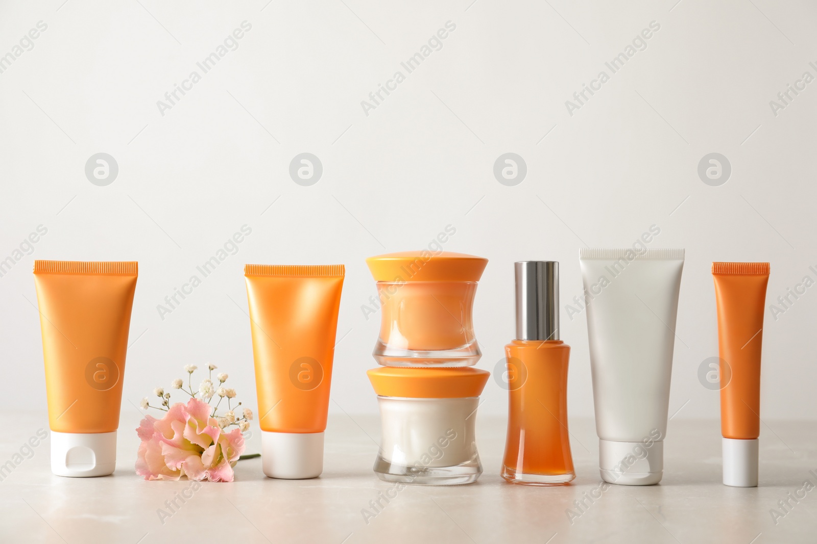 Photo of Set of luxury cosmetic products on light table