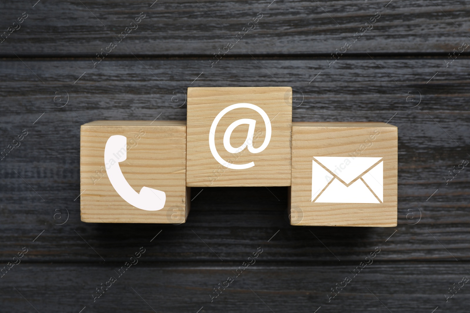 Image of Hotline service. Cubes with icons on wooden background, top view