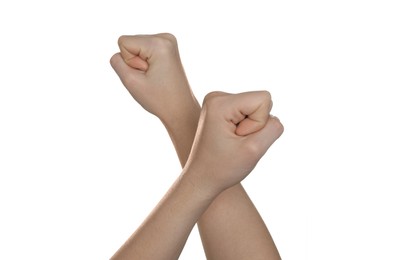 Photo of Freedom concept. Woman showing fists on white background, closeup