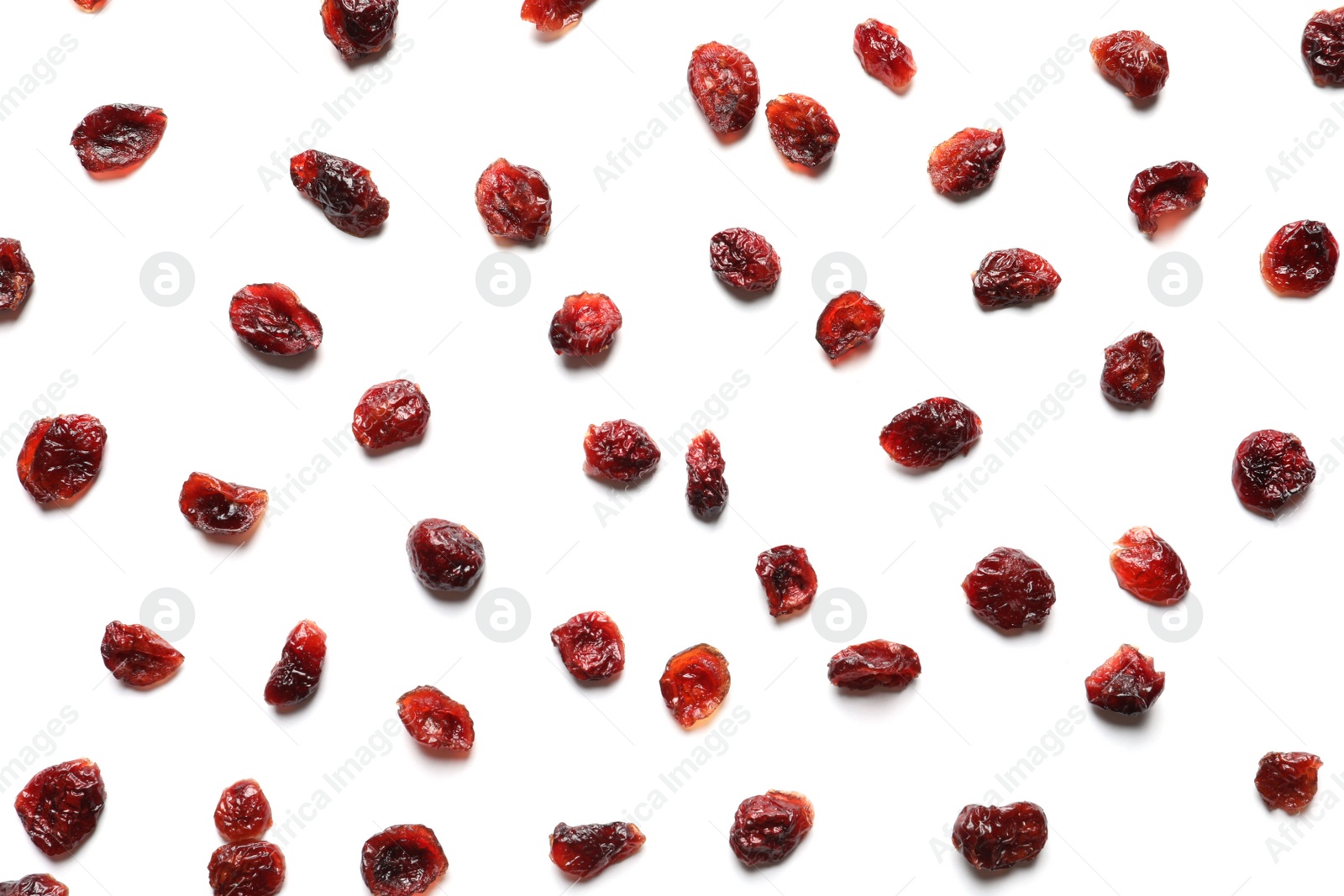 Photo of Flat lay composition of cranberries on white background. Dried fruit as healthy snack