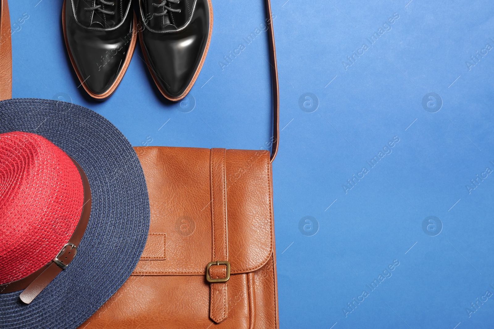 Photo of Flat lay composition with lady's shoes, hat and bag on color background, space for text