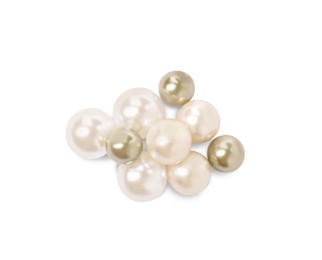 Photo of Many beautiful oyster pearls on white background, to view