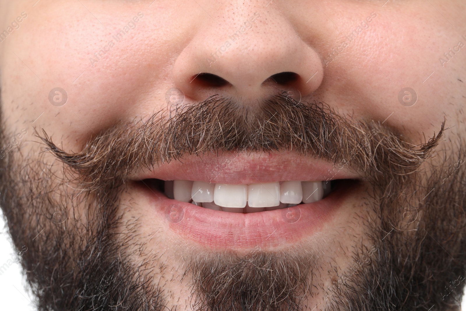 Photo of Happy man with mustache on white background, closeup