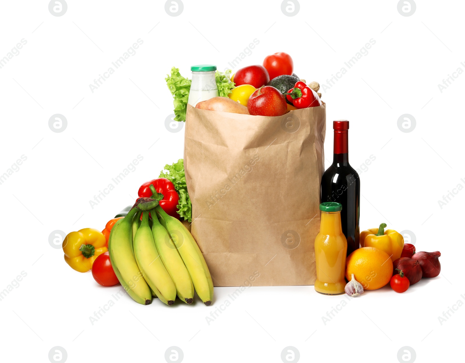 Photo of Paper bag with groceries on white background