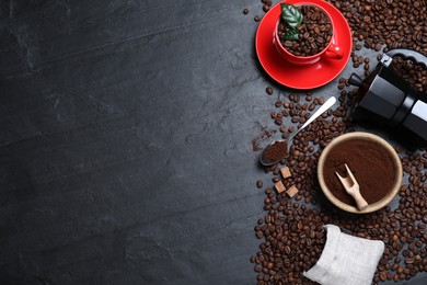 Flat lay composition with roasted coffee beans on black table. Space for text