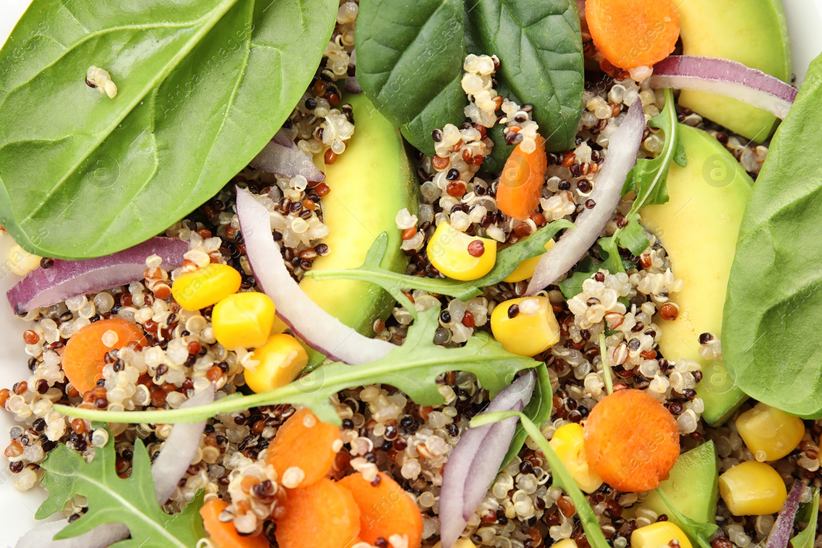 Photo of Healthy fresh quinoa salad with vegetables as background