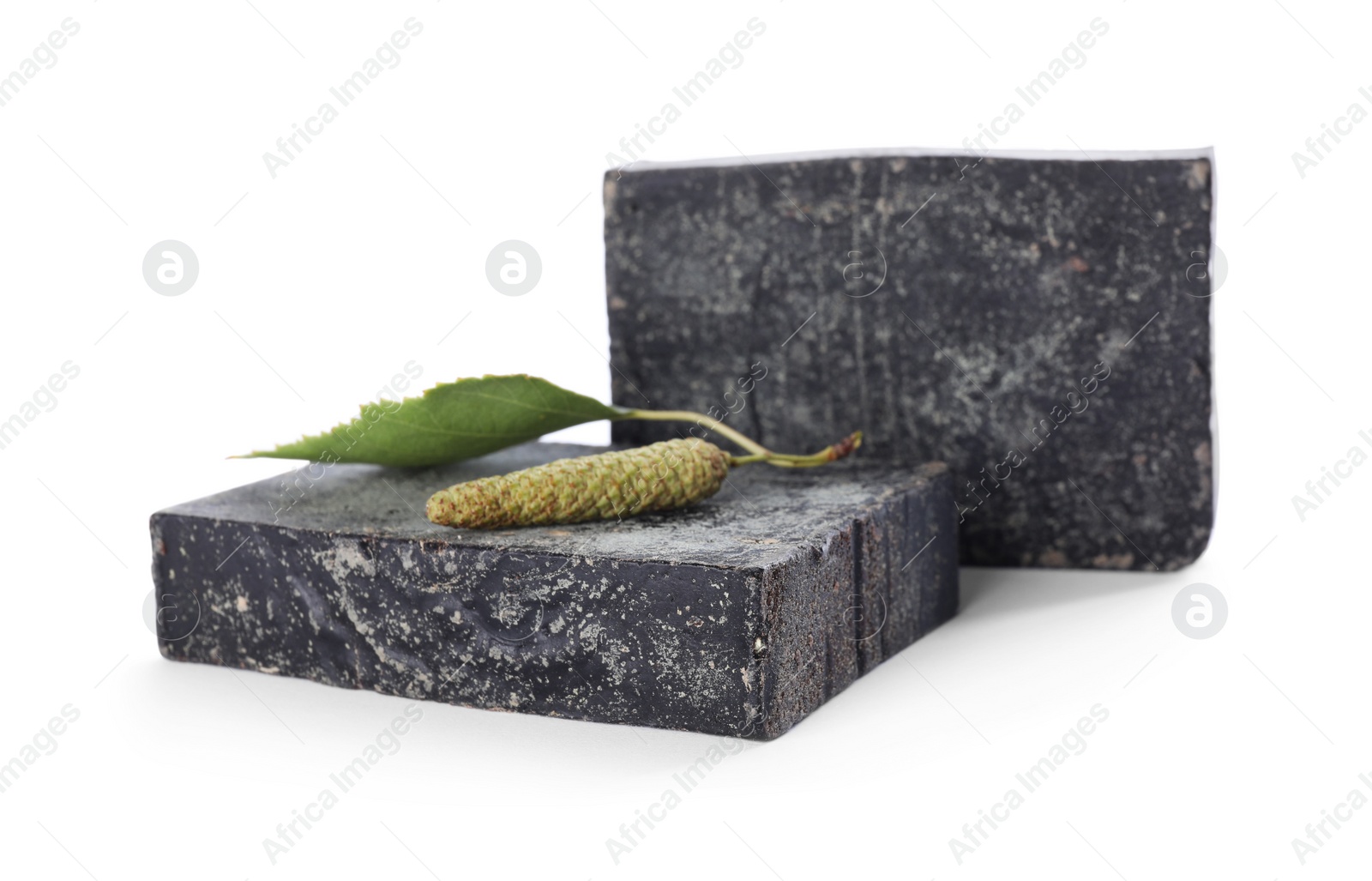 Photo of Tar soap bars isolated on white. Natural product