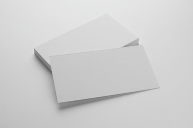 Blank business cards on white background. Mockup for design