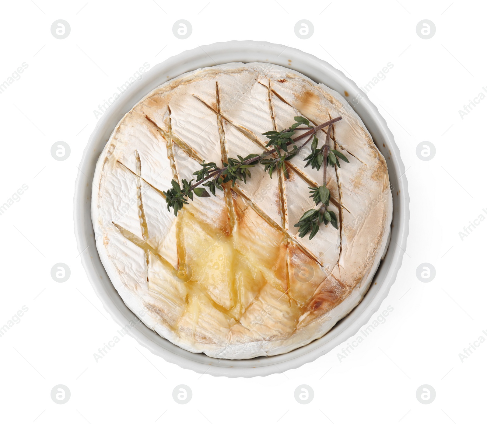 Photo of Tasty baked camembert and thyme in bowl isolated on white, top view