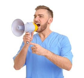 Male doctor shouting into megaphone on white background
