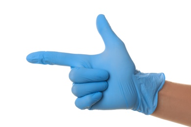 Photo of Person in blue latex gloves pointing at something against white background, closeup on hand
