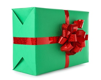 Photo of Christmas gift box decorated with ribbon bow on white background