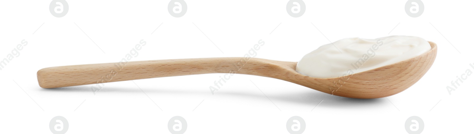 Photo of One wooden spoon with mayonnaise isolated on white