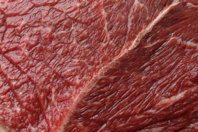 Photo of Texture of fresh beef meat as background, closeup