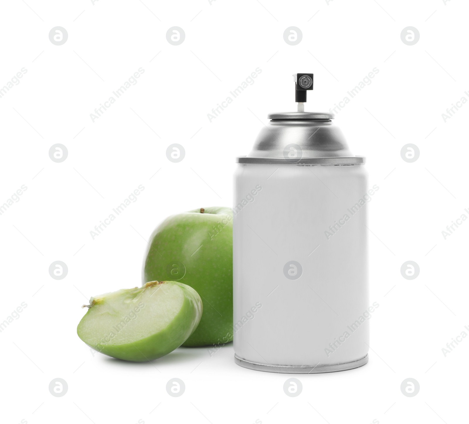 Photo of Spray air freshener and apple on white background