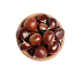 Fresh sweet edible chestnuts in wooden bowl on white background, top view