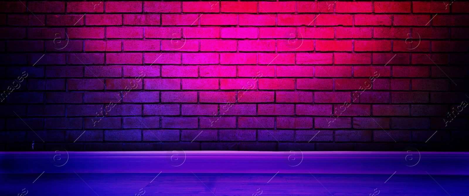 Image of Room with brick wall and wooden floor in neon lights, banner design