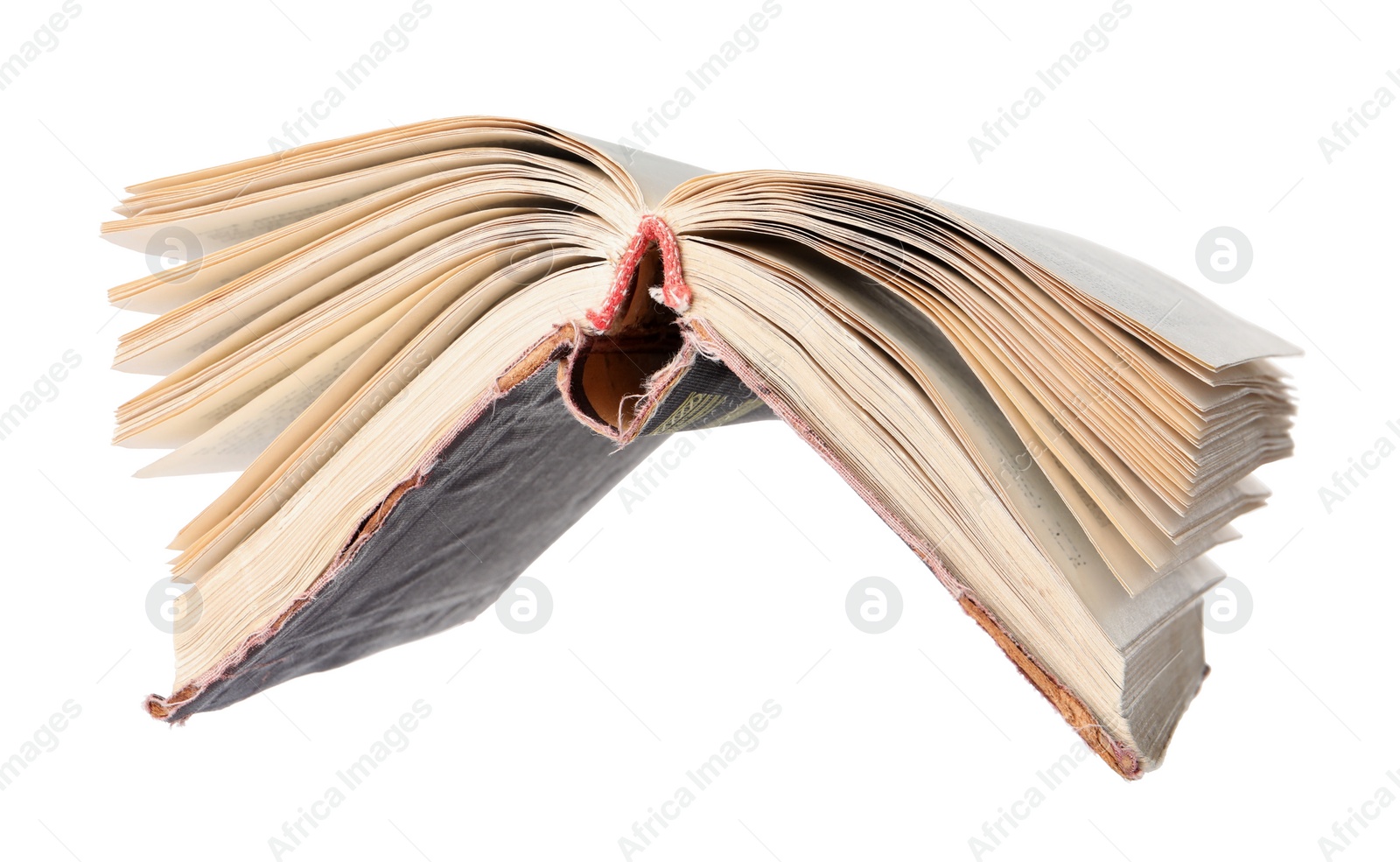 Photo of Open old hardcover book on white background