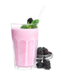 Photo of Tasty blackberry milk shake with fresh berries and mint isolated on white