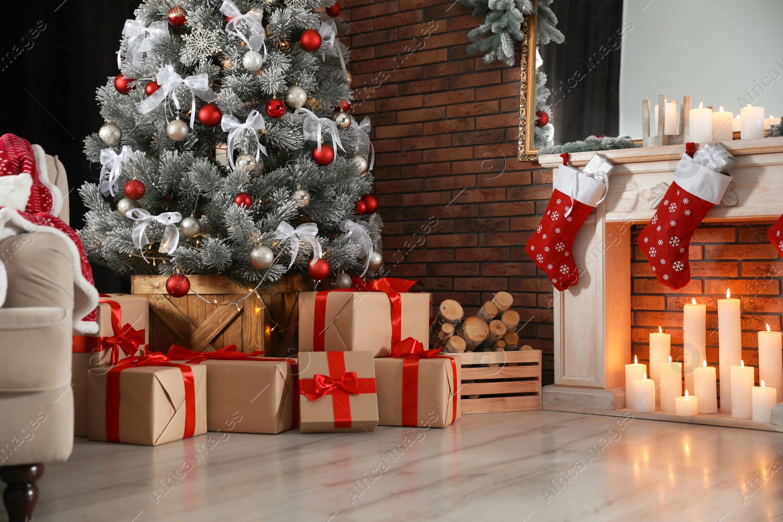 Photo of Beautiful decorated Christmas tree in living room