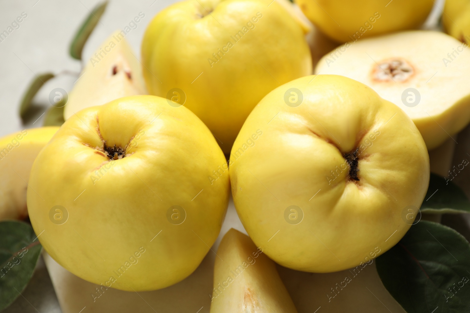 Photo of Fresh ripe organic quince fruits, closeup view