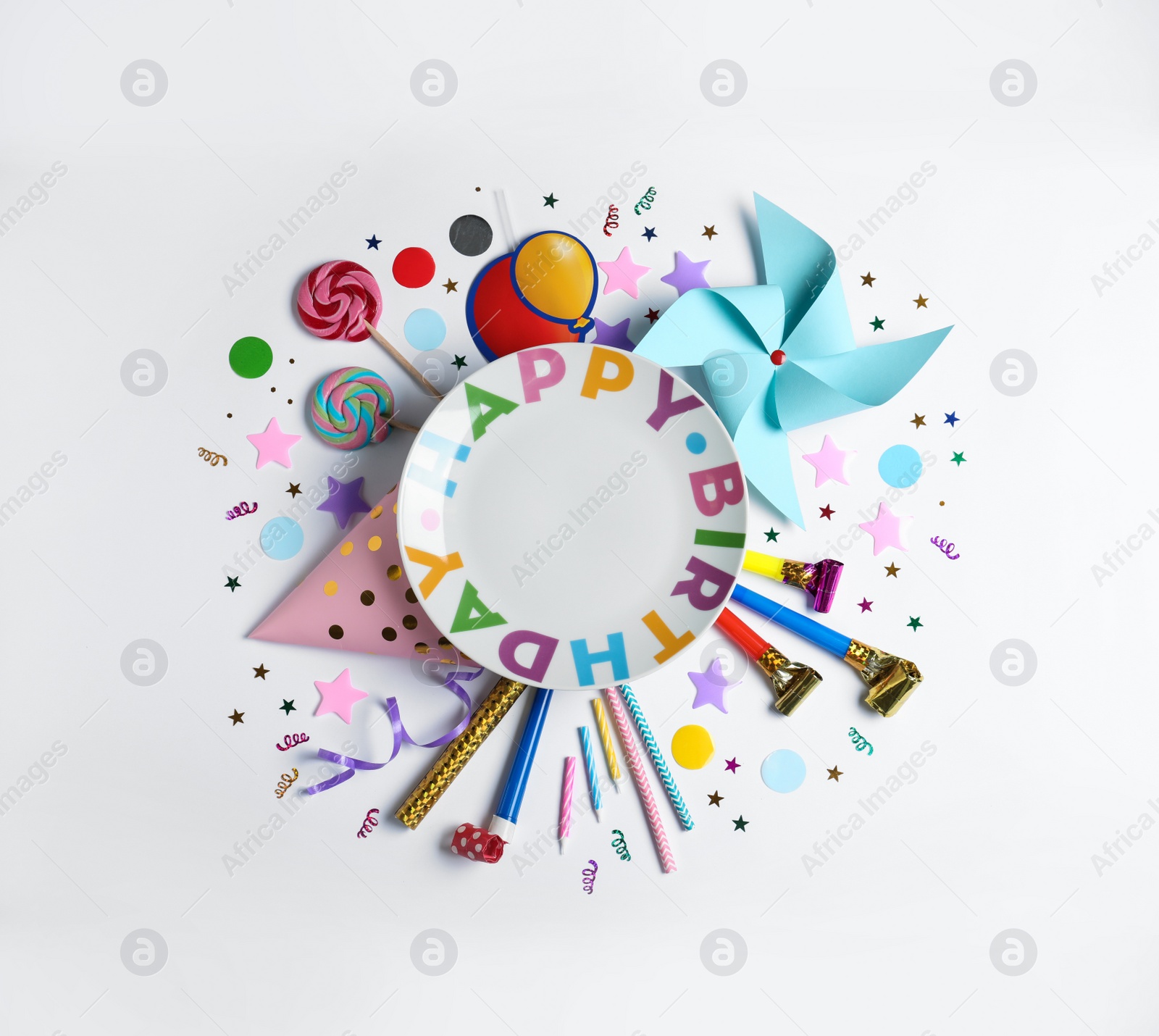 Photo of Composition with birthday party items on white background, top view. Space for text