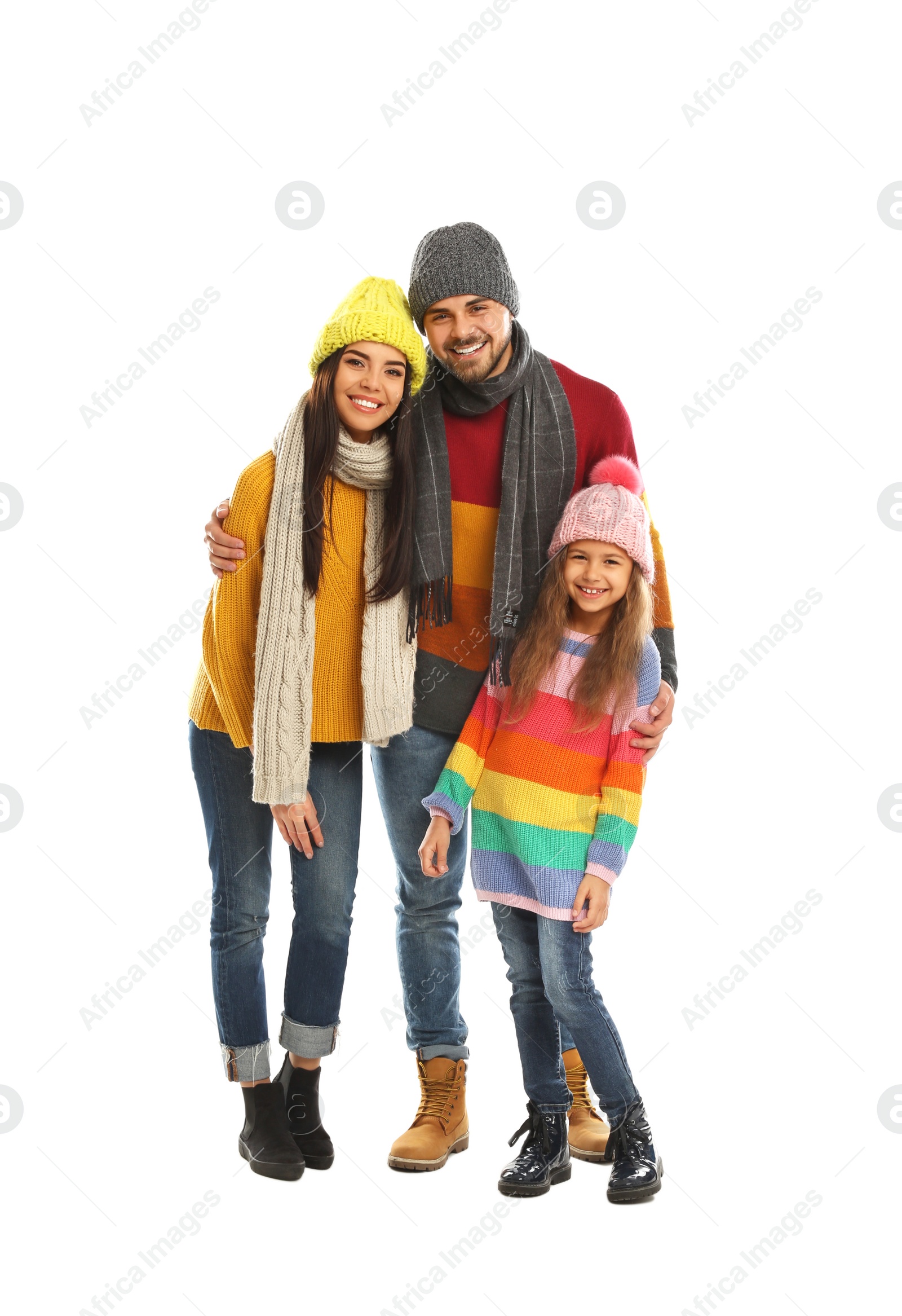 Photo of Happy family in warm clothes on white background. Winter vacation