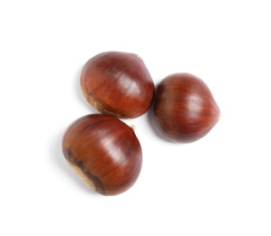 Photo of Fresh sweet edible chestnuts on white background, top view