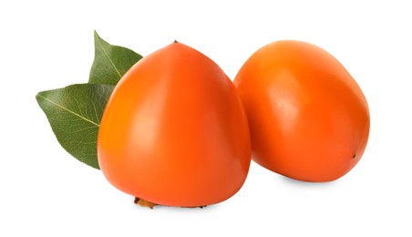 Delicious ripe juicy persimmons on white background