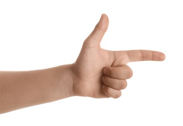 Photo of Teenage boy pointing at something on white background, closeup