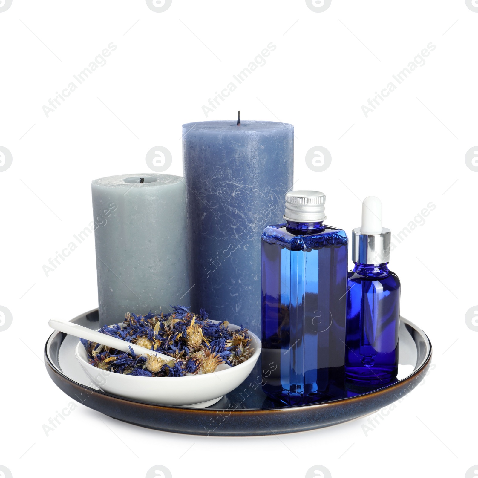 Photo of Spa composition. Cosmetic products, candles and dry flowers isolated on white