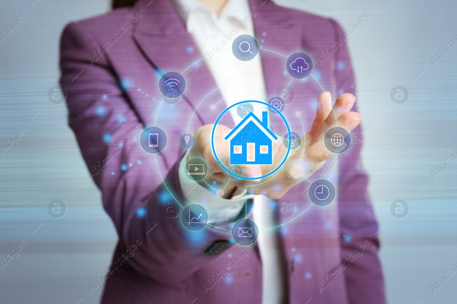 Image of Home security concept. Woman demonstrating digital house on grey background, closeup