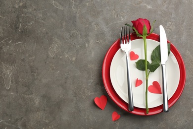 Photo of Beautiful table setting on grey background, flat lay with space for text. Valentine's Day dinner