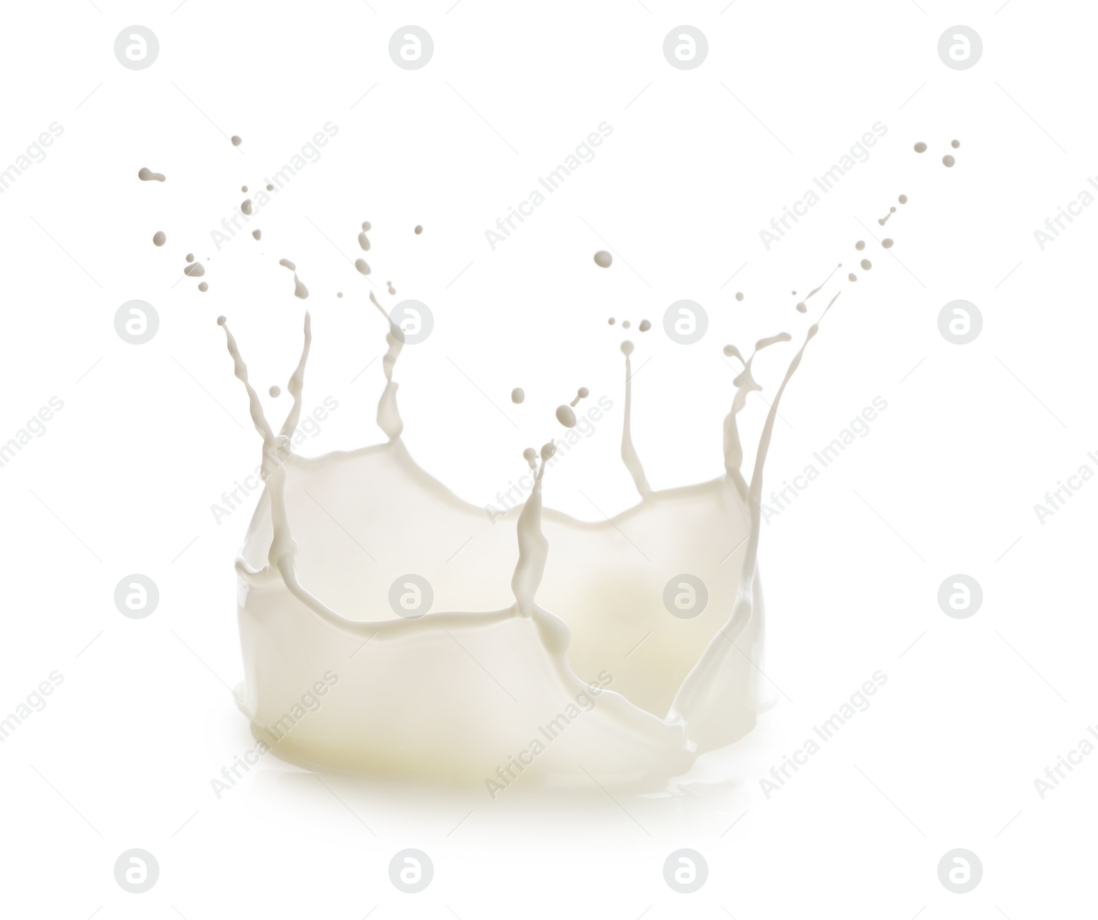 Photo of Splash of fresh milk isolated on white