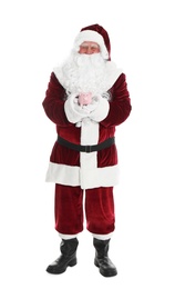 Photo of Santa Claus holding piggy bank on white background
