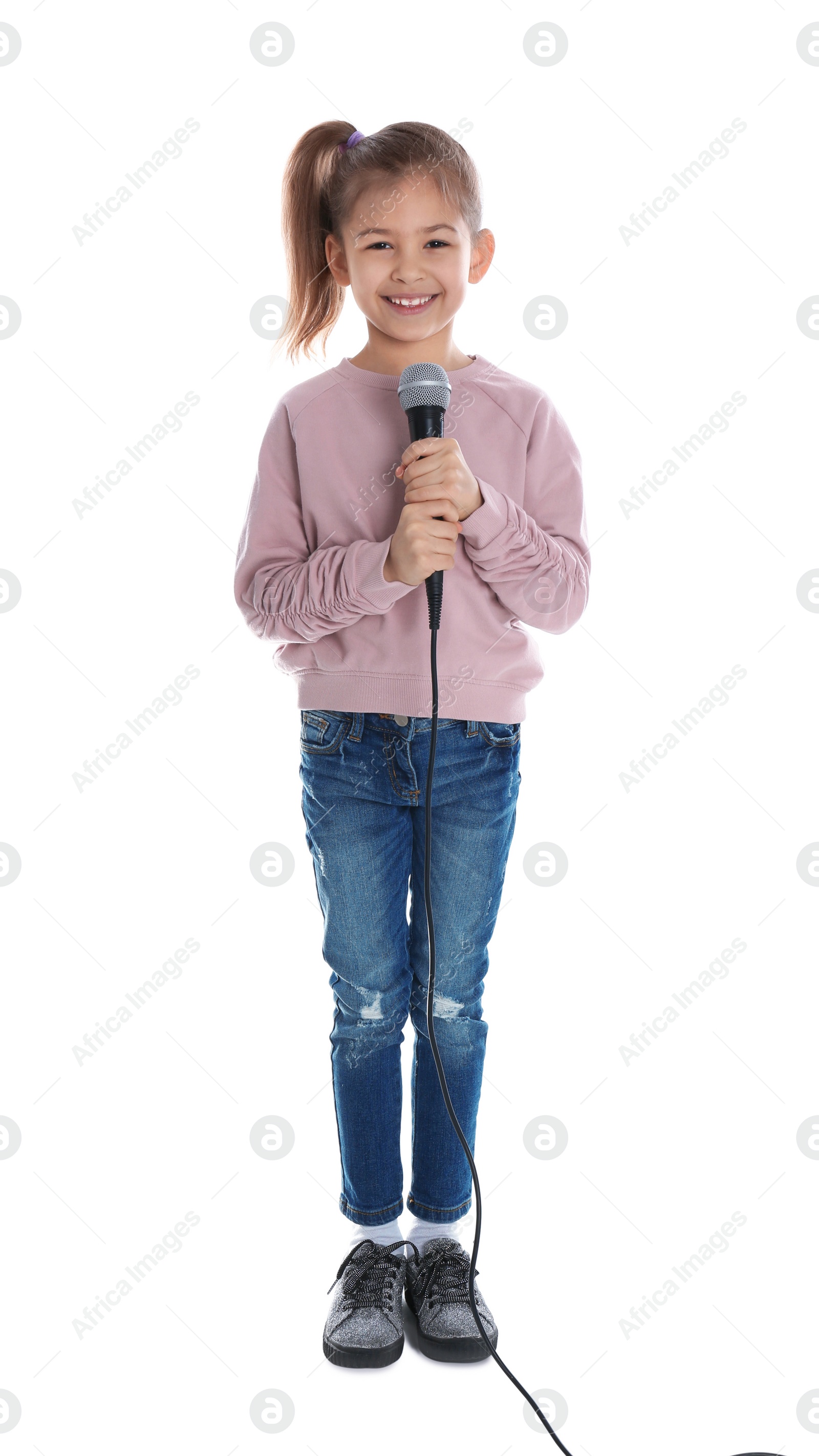 Photo of Cute funny girl with microphone on white background