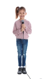 Photo of Cute funny girl with microphone on white background