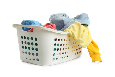 Laundry basket with clothes isolated on white