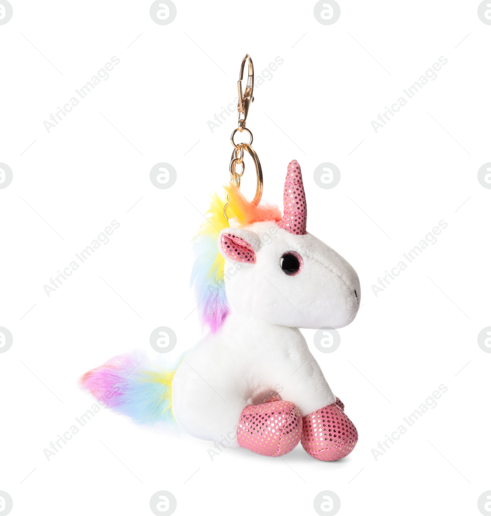 Photo of Cute soft unicorn keychain on white background