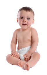 Photo of Cute baby in dry soft diaper sitting isolated on white