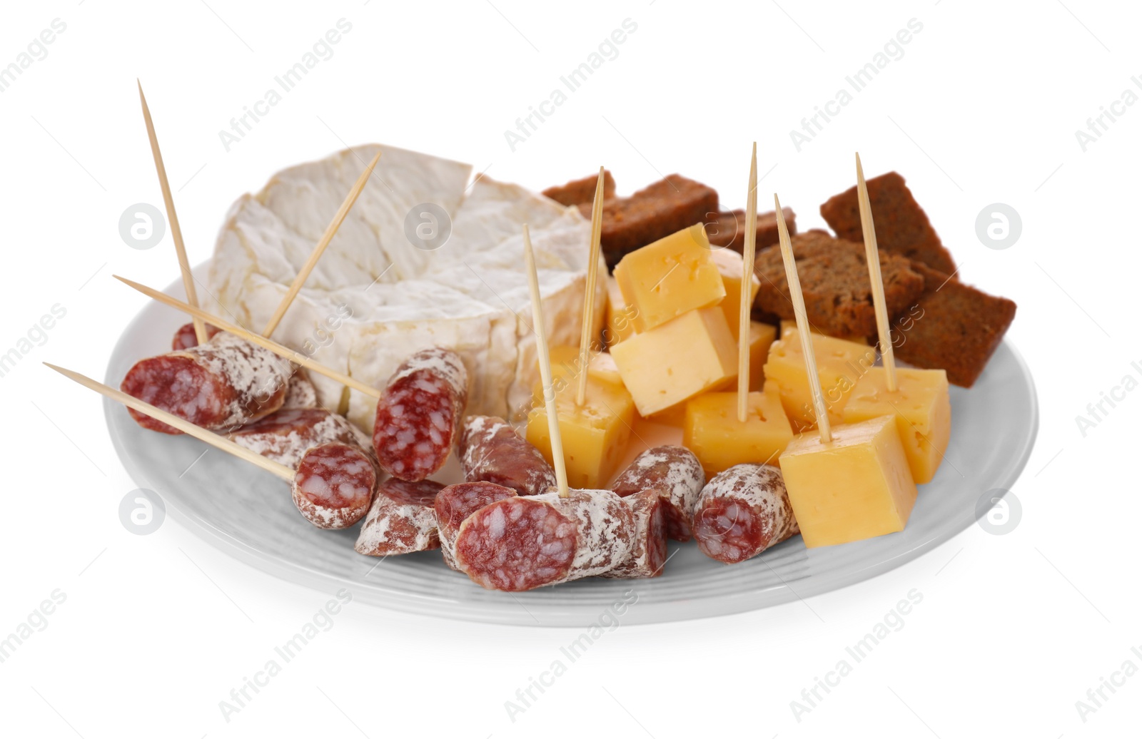 Photo of Toothpick appetizers. Tasty cheese, sausage and croutons on white background