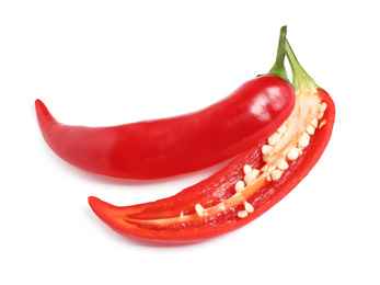 Photo of Cut red hot chili pepper on white background