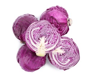 Whole and cut red cabbages on white background, top view