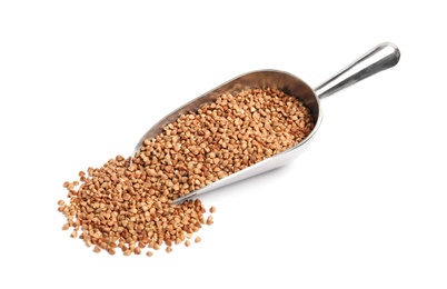 Photo of Scoop with uncooked buckwheat on white background