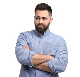 Photo of Portrait of sad man with crossed arms on white background