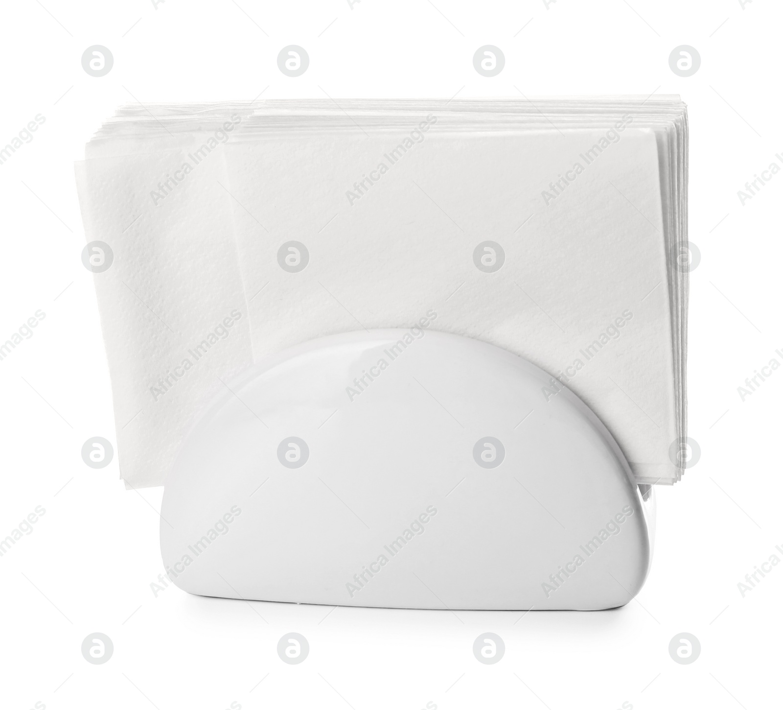 Photo of Ceramic napkin holder with paper serviettes on white background