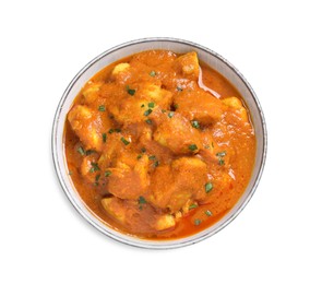 Photo of Bowl of delicious chicken curry on white background, top view