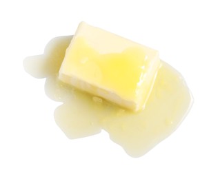 Photo of Piece of melting butter on white background, top view