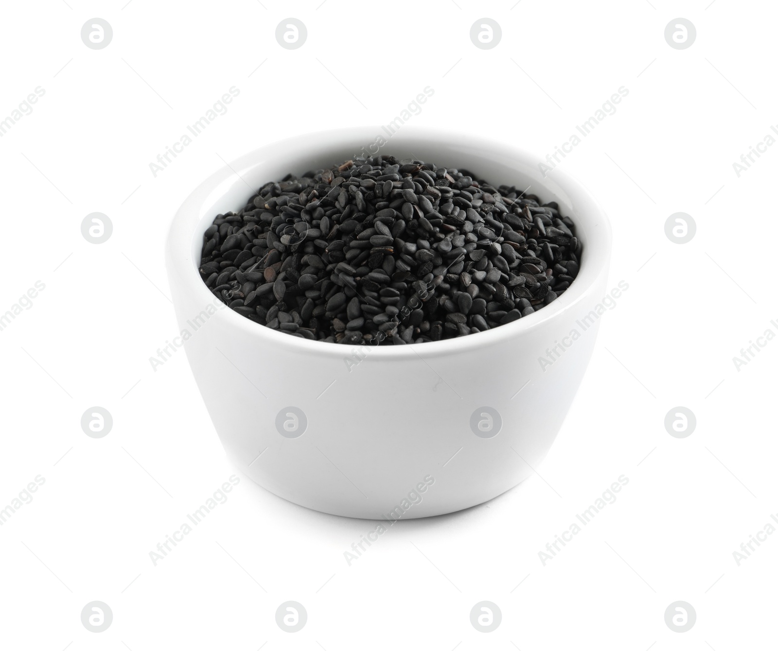 Photo of Black sesame seeds in bowl on white background. Delicious sauce condiment