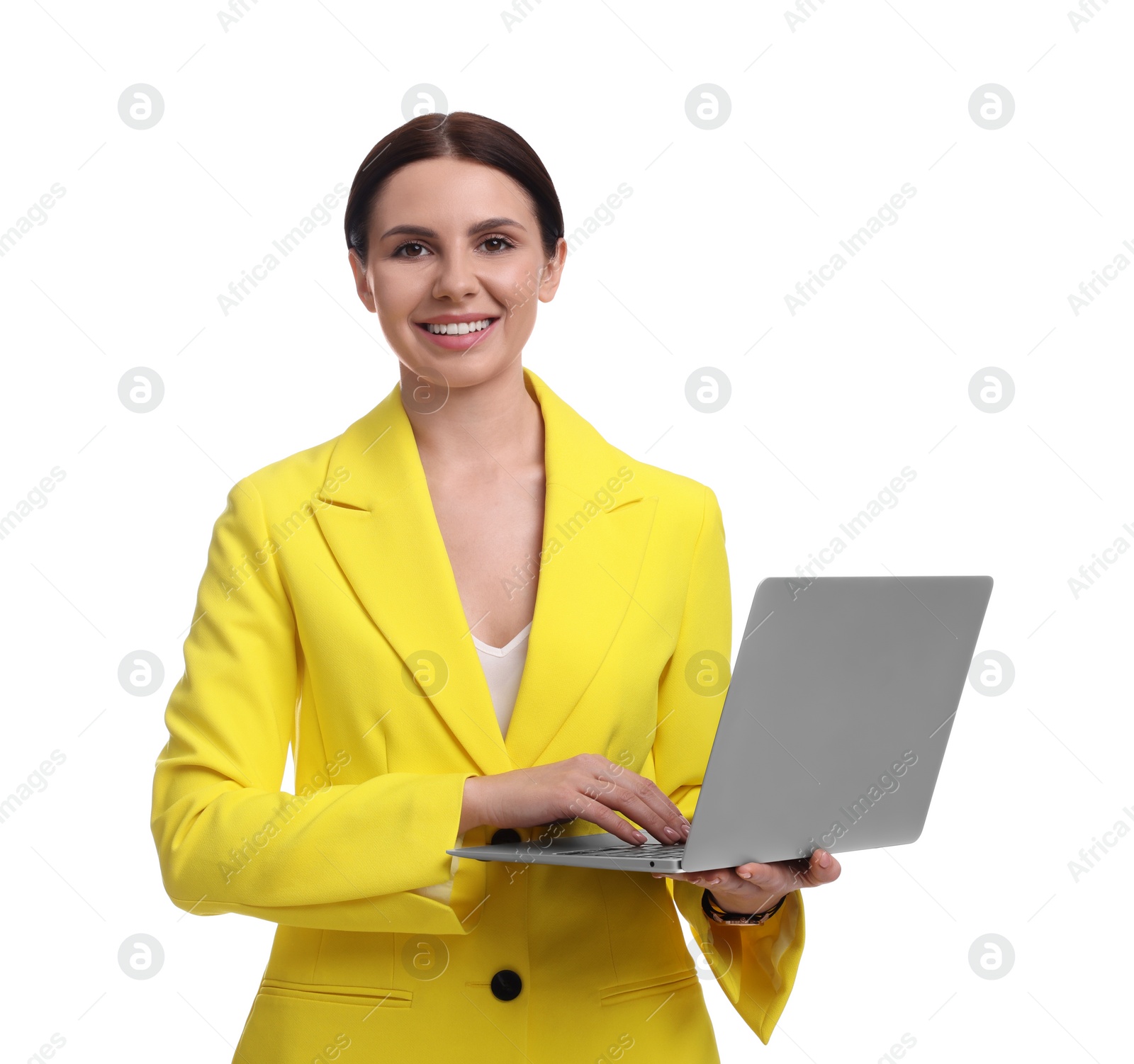 Photo of Beautiful businesswoman in yellow suit with laptop on white background